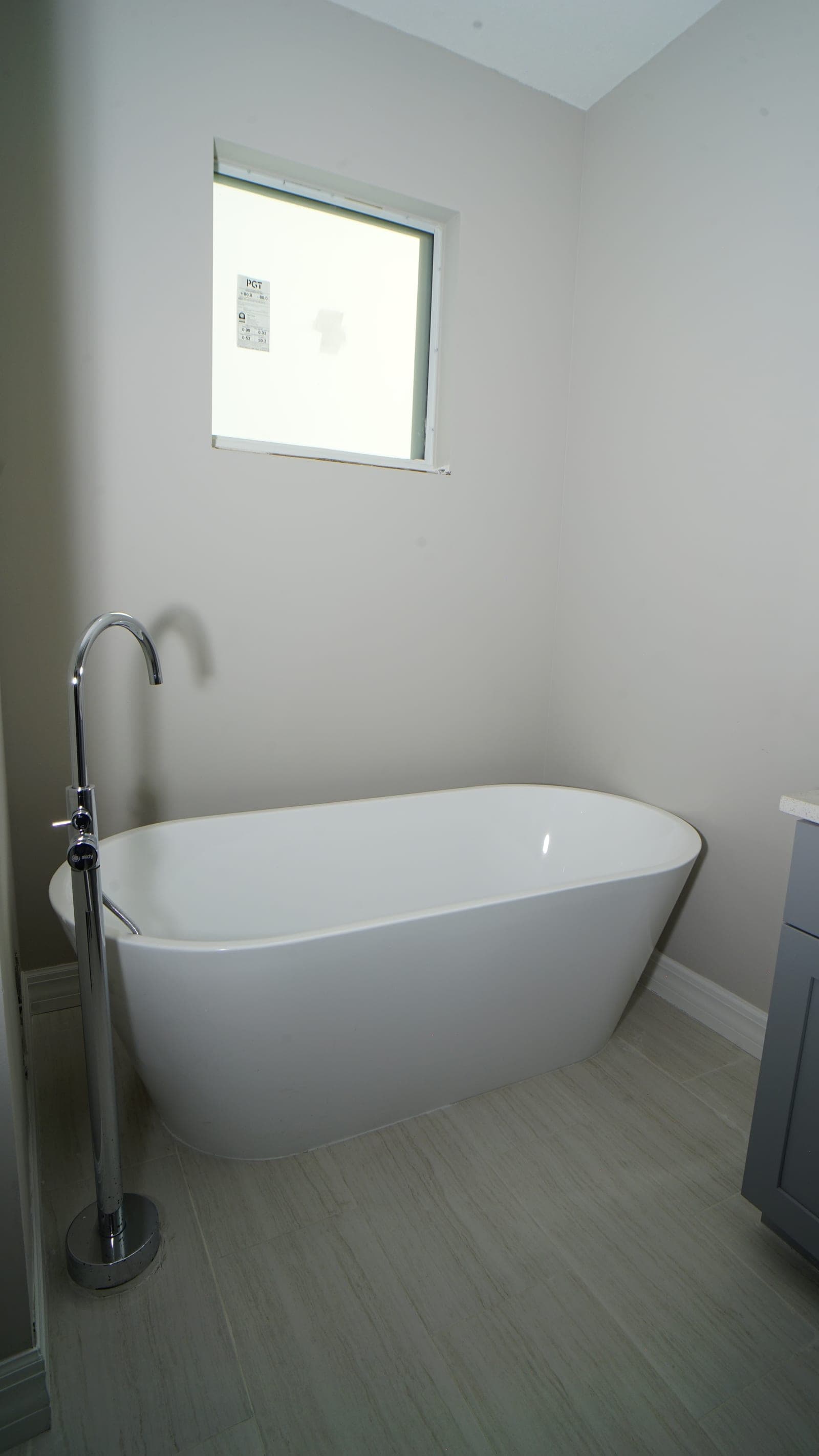 Freestanding soaking tub in the primary bathroom